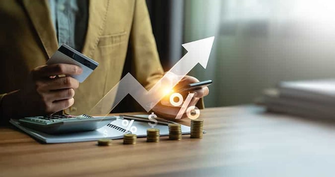 Businessman calculates credit card interest, special offer of shopping department store and discount. Interest rate, installment payment, promotion, marketing, boost sales, Economic recession, Payment